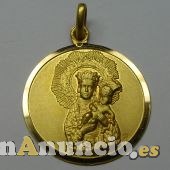 MEDALLA VIRGEN DE LA ALMUDENA EN ORO Y EN PLATA.